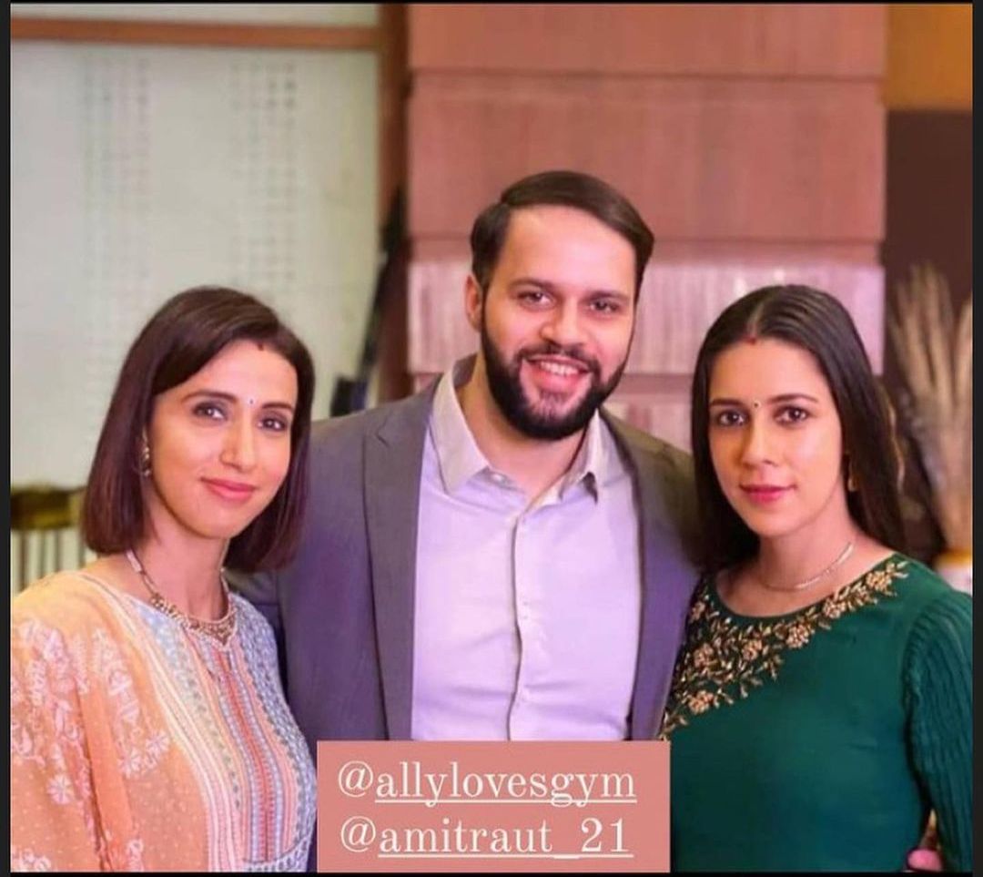 Alesia Raut with her brother and sister
