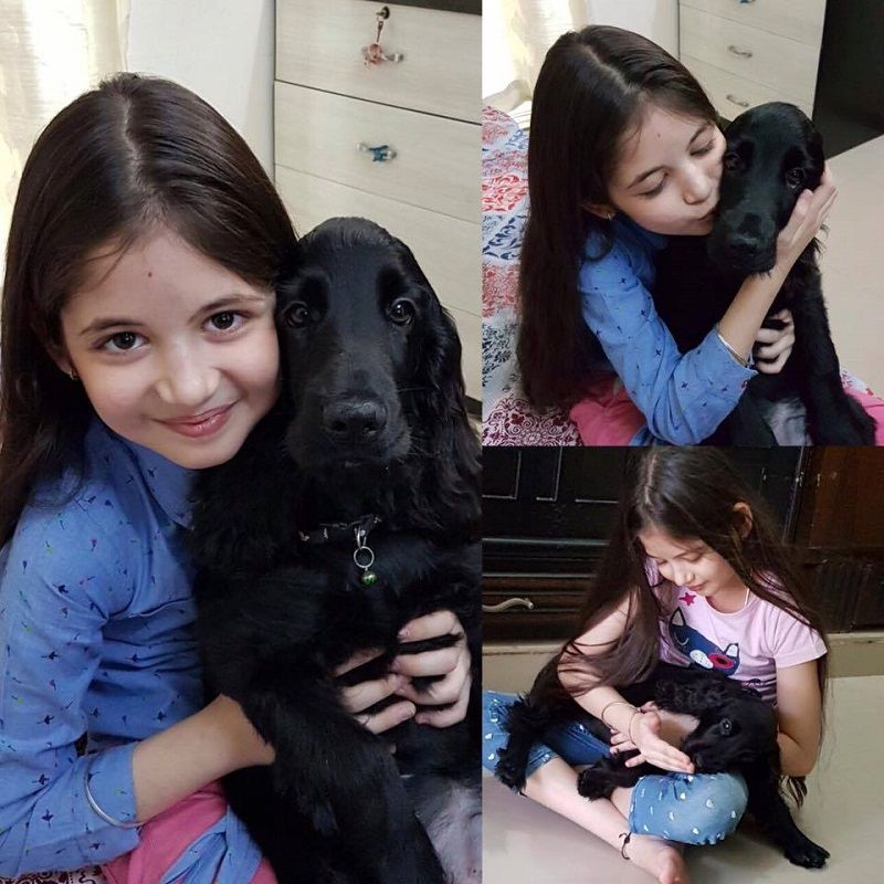 Harshali with her pet dog Leo