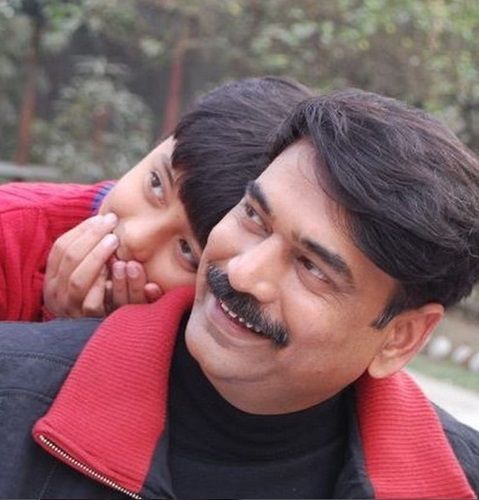 Kamal Khan with his son