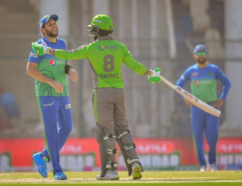 Mohammad Hafeez and Shahid Afridi shares a joke in a PSL match on 26 February 2021