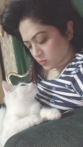 Raima Islam Shimu and her pet cat