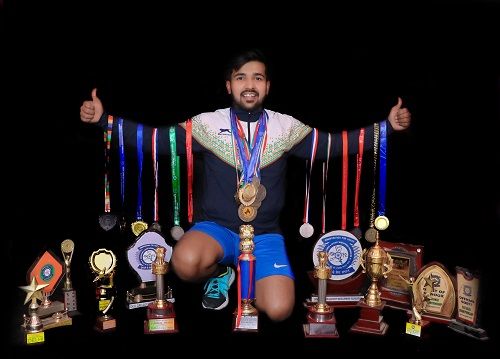 Shivam Thakur with his medals
