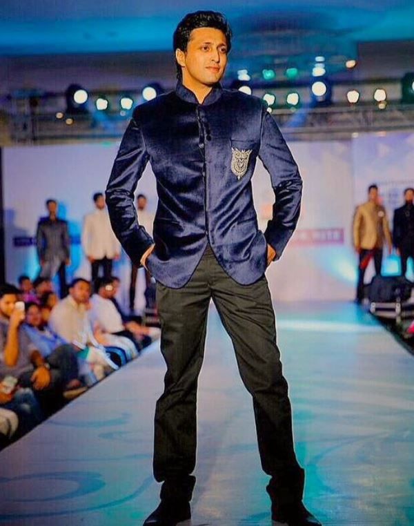 Yash Pandit walking down the fashion runway