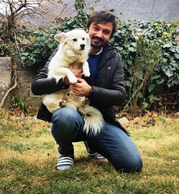 Asfar Hussain with his pet dog Roussie