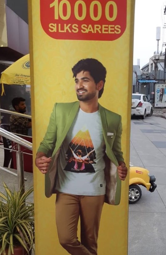 Anil Rathod on an advertisement board