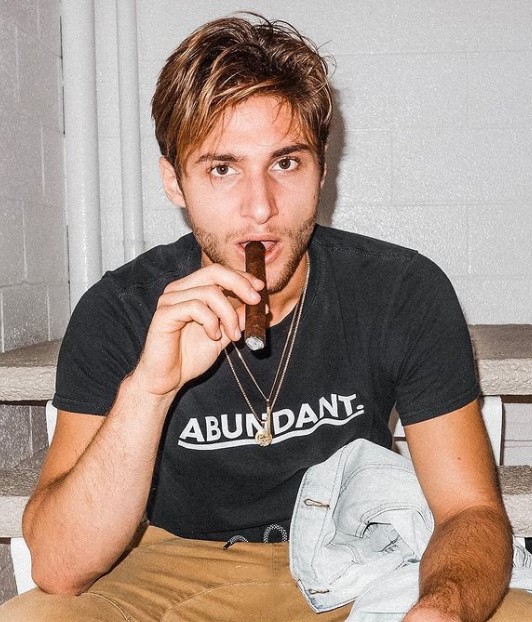 Shane Gregoire while smoking cigar