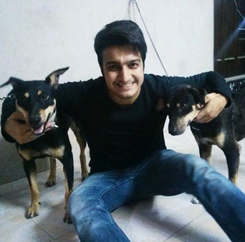 Sherry Khattak with his pet dogs