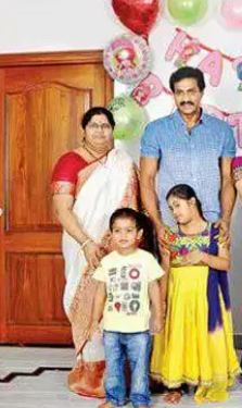 Sunil Varma with his wife and children