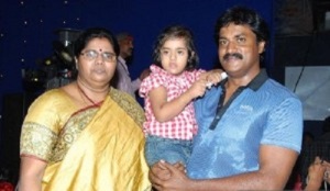 Sunil Varma with his wife and daughter