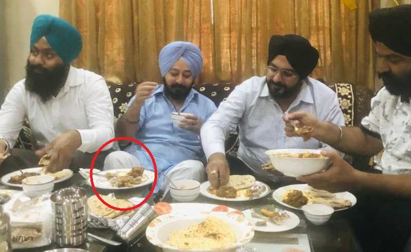 Ajitpal Singh Kohli eating chicken