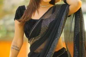 Ashu Reddy in a black saree