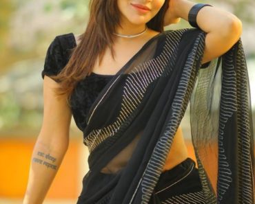 Ashu Reddy in a black saree