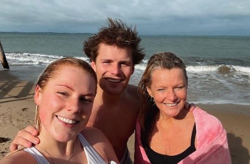 Brooke Warne with her mother and brother