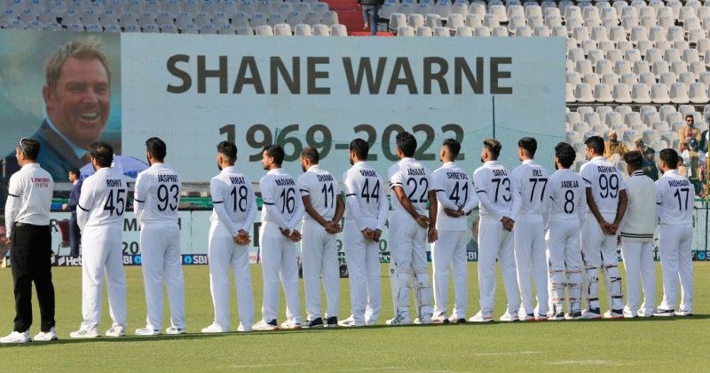 Indian team paying tribue to Shane Warne and wearing black armbands