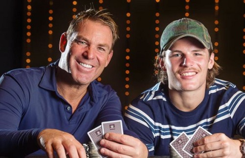 Jackson Warne playing poker with his father