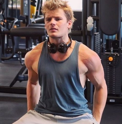 Jackson Warne working out in the gym