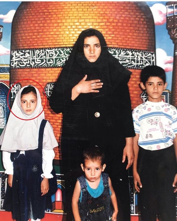 Mandana with her mother and two brothers