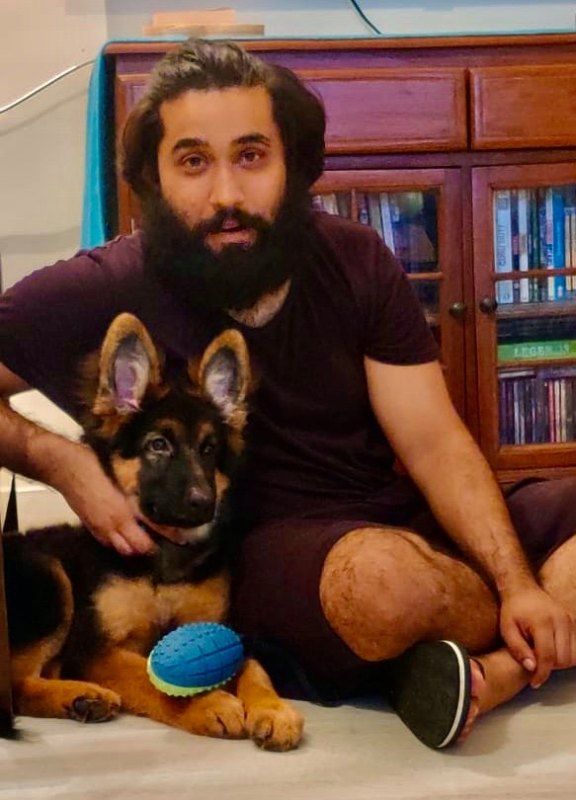 Mayank Pahwa posing with his dog