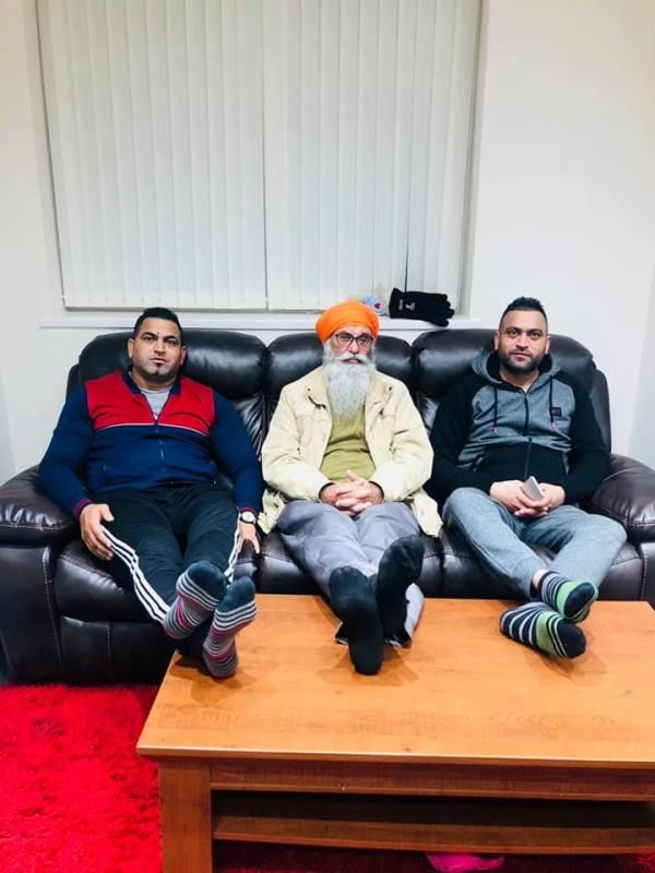 Sandeep Nangal with his father and brother