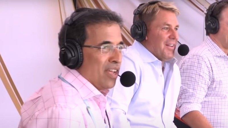Shane Warne (right) commentating during a match