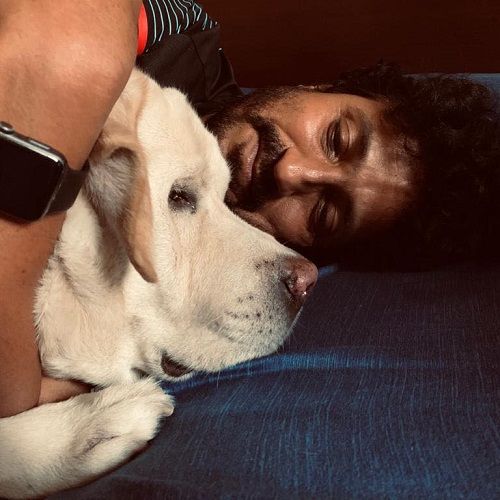 Vinod Kapri with his pet dog