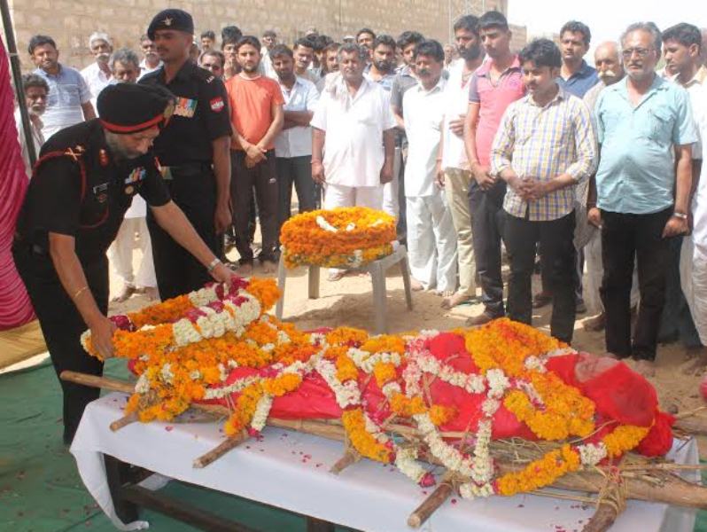 Wreath being laid by army on the death of the Mrs. Shagun Kanwar wife of Major Shaitan Singh, PVC