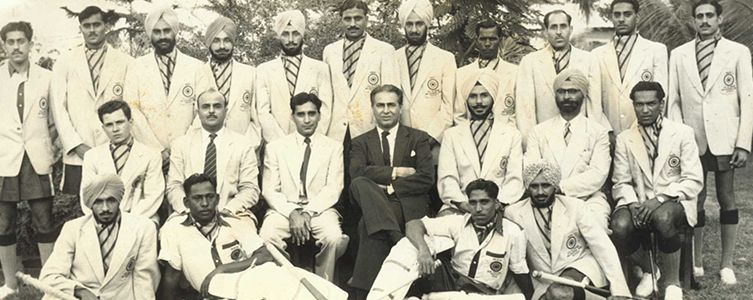 Naval Tata with hockey team players 