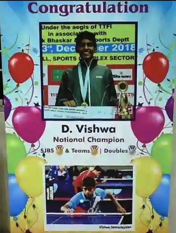 A banner congratulating Vishwa Deenadayalan for becoming a National Champion