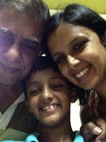 A picture of Shiv Kumar Subramaniam with his wife and son