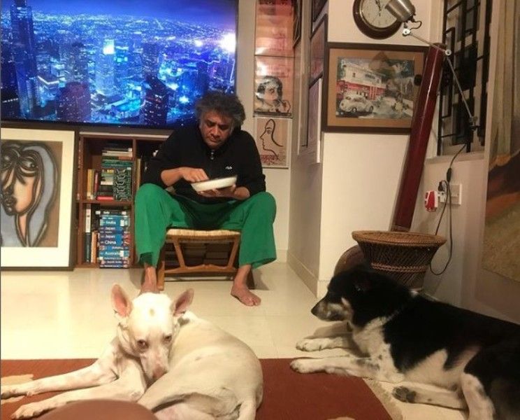 Aakar Patel with his pet dogs