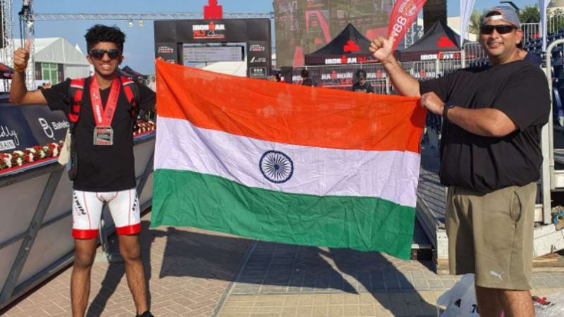 Aditya Choudhary holding the national flag