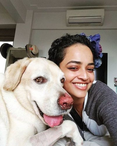 Anjali Sivaraman with her pet dog