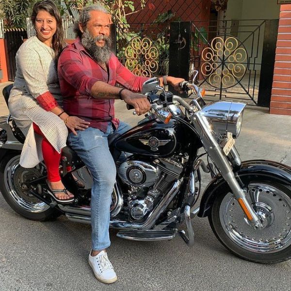 Avinash poses with his Harley Davidson