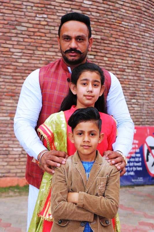 Dharminder Singh with his son and daughter