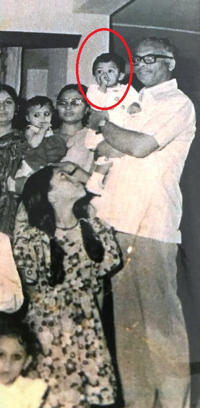 Falu as a toddler with her father