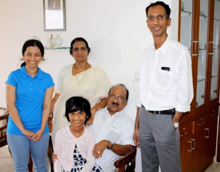 K. V. Thomas with his wife, Sherly Thomas, his younger son Joe Thomas, and daughter-in-law Annu