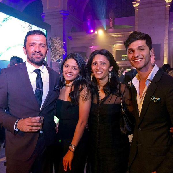 Picture of Atul with his children and wife