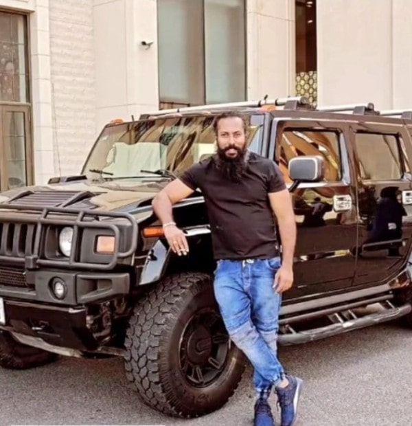 Ramachandran Raju with his car, Hummer