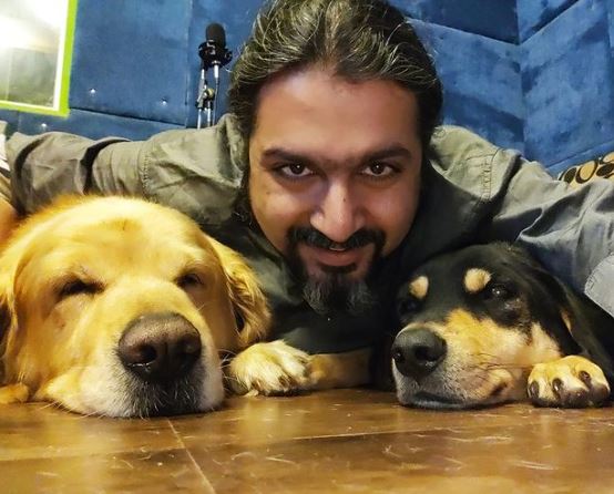 Ricky Kej with his pet dogs