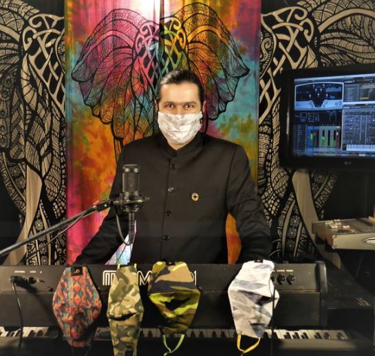 Ricky Kej working on a music project