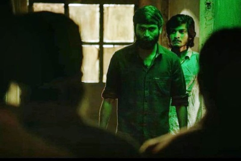 Saran with Dhanush in the film Vada Chennai