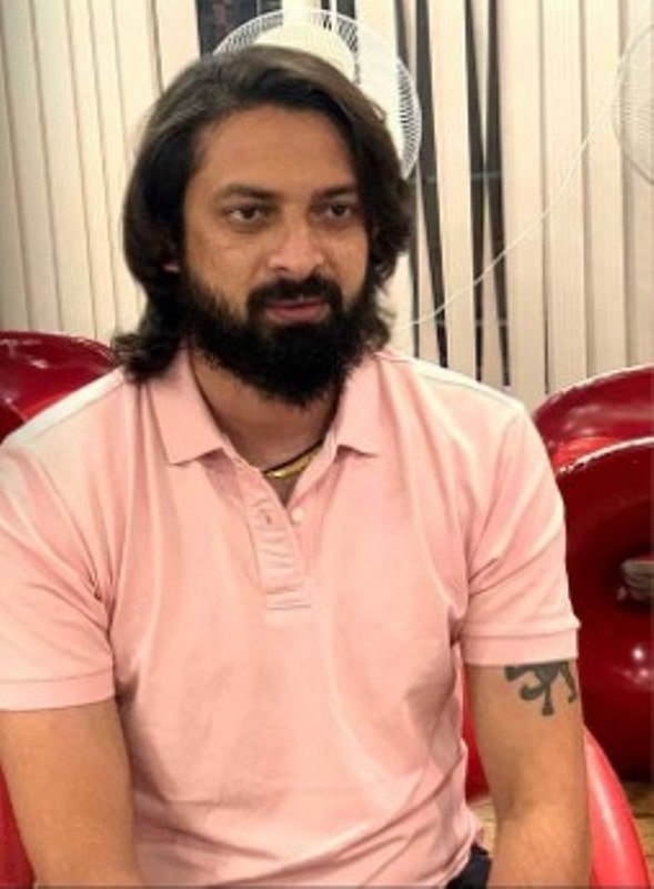 Vinay Bidappa's tattoo on the left arm