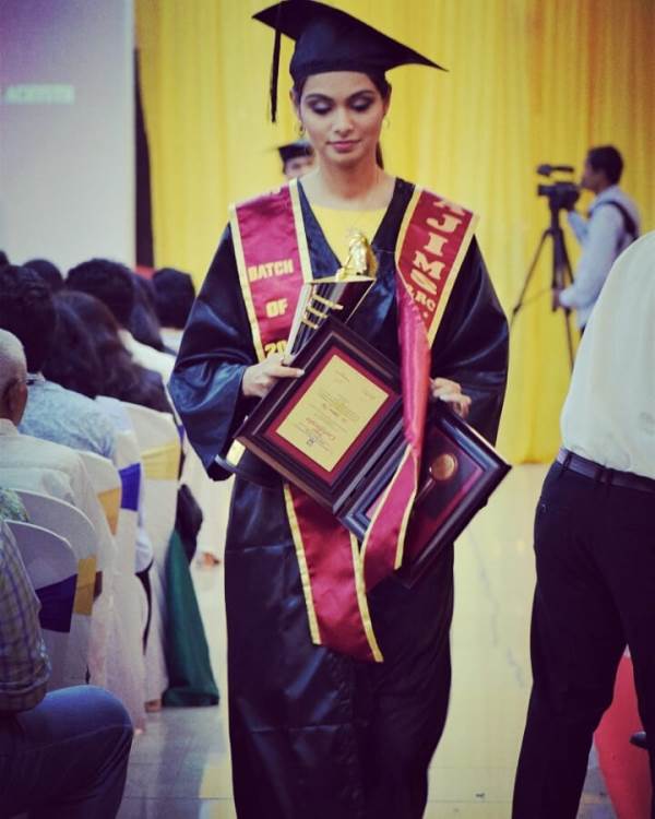 Aafreen after receiving her degree and trophy at AJ Institute of Medical Science, Mangaluru.