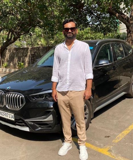 Deepak Kumar Mishra with his BMW