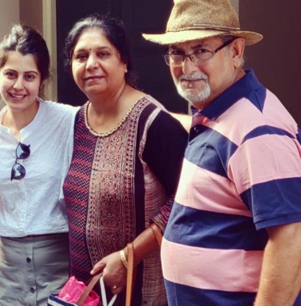 Divya Harjai with her parents
