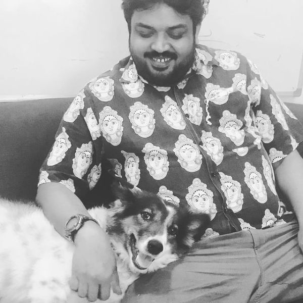 A picture of Faizal Malik with his dog
