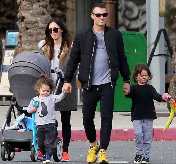 Fox and Brian taking their three children to the Los Angeles Zoo before separating