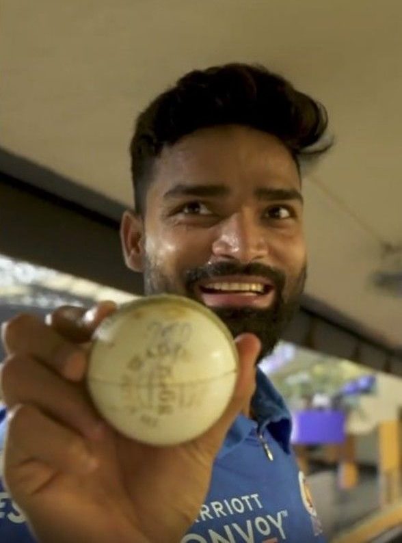 Kumar Kartikeya with the ball signed by MS Dhoni