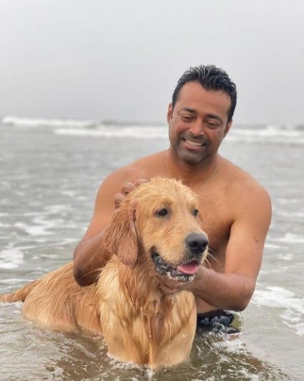 Leander Paes with his dog on the beach