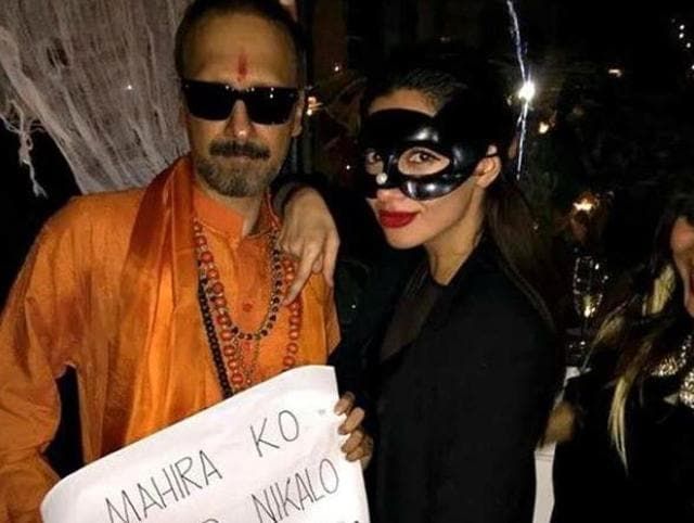 Mahira Khan posing for a picture with a person dressed up as a Shiv Sena worker